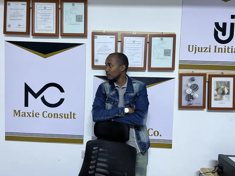 The Maxie Consult office in Dodoma, with the company’s registration certificates on the wall